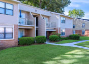 Thumbnail 7 of 20 - our apartments have a spacious yard and balconies for residents to enjoy at Sawgrass Apartments, South Carolina, 29412