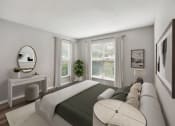 Thumbnail 17 of 19 - a bedroom with a large bed and a large window at Chapel View Apartments in Chapel Hill, NC