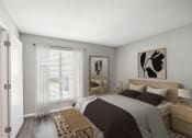 Thumbnail 19 of 19 - Bedroom with a Large Bed