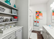 Thumbnail 24 of 26 - A bathroom with a white sink and a white toilet at Proximity Apartments, South Carolina, 29414