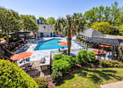 Thumbnail 2 of 21 - Aerial View of the Resort Style Pool at Palmetto Place Apartments, Taylors, 29687