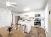 Thumbnail 8 of 19 - Gourmet Kitchen With Island at Hyde Park Townhomes, PRG Real Estate Management, Virginia