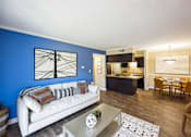 Thumbnail 6 of 32 - Living Room With Kitchen View at The Grove at Lyndon, Kentucky