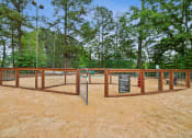 Thumbnail 7 of 19 - a fenced in area with trees in the background and a sign at Chapel View Apartments in Chapel Hill, NC