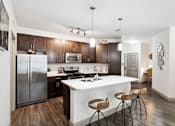 Thumbnail 21 of 29 - Kitchen with Large White Island at The Loree, Jacksonville, FL, 32256