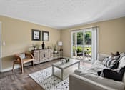 Thumbnail 27 of 32 - Living room area at the grove at Lyndon apartments Louisville, KY