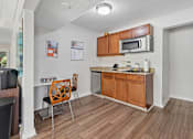 Thumbnail 22 of 32 - Kitchen Area at The Grove at Lyndon Apartments Louisville KY