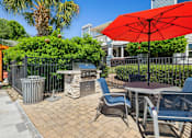 Thumbnail 14 of 21 - Exterior Lounge Area at Palmetto Place Apartments, Taylors, 29687