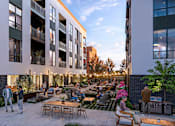 Thumbnail 6 of 13 - The Mews Courtyard amenity space at Poppy in Richmond, VA