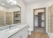 Thumbnail 23 of 35 - Spacious Bathroom with Walk-In Shower at Park at Rialto Apartments, San Antonio
