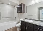 Thumbnail 29 of 39 - Spacious Bathroom with Tub at District Medical Center, San Antonio