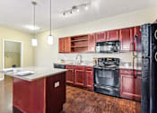 Thumbnail 14 of 25 - Spacious Kitchen and Dining Area at Overlook at Stone Oak Park Apartments, San Antonio, 78258
