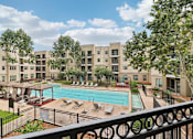 Thumbnail 37 of 39 - Daytime View of the Pool at District at Medical Center, San Antonio