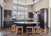 Thumbnail 7 of 25 - Clubhouse Kitchen Lounge at Overlook at Stone Oak Park Apartments, San Antonio, 78258
