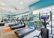 Thumbnail 29 of 35 - Fitness Room at Park at Rialto Apartments, San Antonio