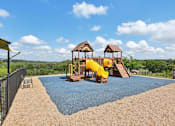 Thumbnail 20 of 25 - Playground - Fully Fenced In  at Overlook at Stone Oak Park Apartments, Texas