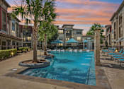 Thumbnail 34 of 35 - Relaxing Evening Pool Time at Rialto Apartments at Park at Rialto Apartments, San Antonio