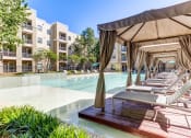 Thumbnail 2 of 31 - Luxurious Pool  & Cabanas & BBQ Area at District at Medical Center, San Antonio