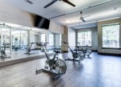 Thumbnail 7 of 31 - Large Fitness Room - Plenty of Fitness Equipment at District at Medical Center, San Antonio
