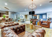 Thumbnail 11 of 31 - Clubhouse Lounge Area at District at Medical Center, San Antonio