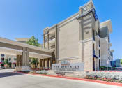Thumbnail 1 of 31 - Entrance to Property & Leasing Office Parking at District at Medical Center, San Antonio