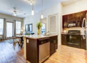 Thumbnail 17 of 31 - Most Floor Plans have Island Kitchens - View Floor Plan Page at District at Medical Center, San Antonio