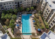 Thumbnail 30 of 31 - Overview of Pool Area at District at Medical Center, San Antonio