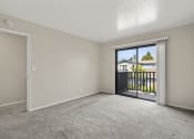 Thumbnail 9 of 15 - Upstairs Bedroom with Patio
