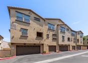 Thumbnail 9 of 10 - View of Apartments and Attached Garages