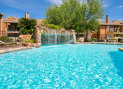 Thumbnail 2 of 11 - Waterfall Pool at Oaks of Westlakes Apartments, San Antonio, Texas