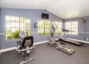 Thumbnail 5 of 11 - Renovated Fitness Room at Oaks of Westlakes Apartments, San Antonio, 78245