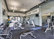 Thumbnail 5 of 19 - Large Fitness Center with Treadmills, Free Weights & Much More  at Overlook at Stone Oak Park Apartments, San Antonio