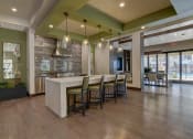 Thumbnail 7 of 35 - Clubhouse Kitchen & Lounge Area at Park at Rialto Apartments, San Antonio