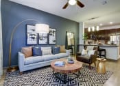 Thumbnail 16 of 35 - MODEL - Spacious Living Roomarge Balcony at Park at Rialto Apartments, San Antonio