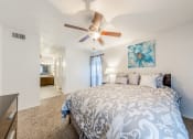 Thumbnail 8 of 11 - Bedroom with Connecting Bathroom at Oaks of Westlakes Apartments, San Antonio, Texas