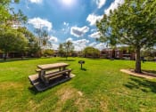 Thumbnail 11 of 11 - Open Picnic Field at Oaks of Westlakes Apartments, San Antonio, TX, 78245