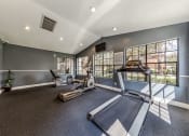 Thumbnail 4 of 11 - Renovated Fitness Room at Oaks of Westlakes Apartments, Texas