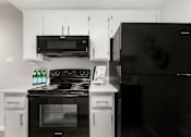 Thumbnail 15 of 22 - Kitchen with Upgraded Appliances