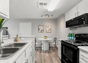 Thumbnail 16 of 22 - Modern Kitchen and Dining Area