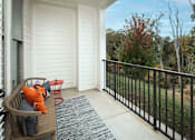 Thumbnail 7 of 48 - a porch with furniture