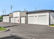 Thumbnail 47 of 60 - Private garages with individual numbered doors at Avli At Crosstown Center Apartments, TAMPA, Florida