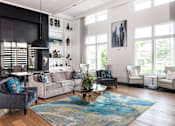 Thumbnail 28 of 60 - Living room with high ceilings and large windows at Avli At Crosstown Center Apartments, TAMPA, 33619