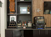 Thumbnail 48 of 60 - Coffee bar with shelving and espresso machine at Avli At Crosstown Center Apartments, Florida, 33619