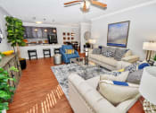 Thumbnail 17 of 54 - Riverstone Model 2 bedroom living room and view of kitchen
