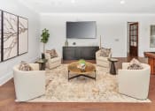 Thumbnail 11 of 54 - Riverstone Clubhouse with seating and TV