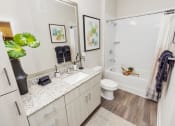 Thumbnail 9 of 46 - bathroom with vanity and bath/shower