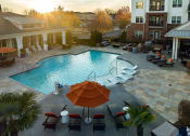 Thumbnail 2 of 78 - an aerial view of a swimming pool with an umbrella