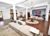Thumbnail 6 of 54 - a clubhouse with couches, table and lighting