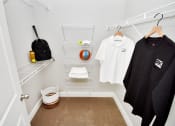 Thumbnail 45 of 54 - Riverstone Model Closet with t-shirts hanging