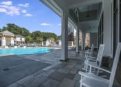Thumbnail 29 of 78 - Pointe at Prosperity Village Poolside Lounge Area in Charlotte, NC Apartments